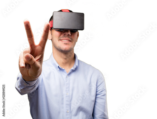 Young man using a virtual glasses