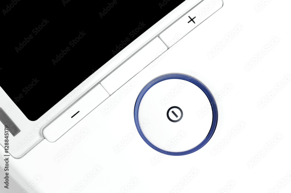 White Medical Device With Blue Circle On Off Button On It White Medical Device With Blue Circle On Off Button On It