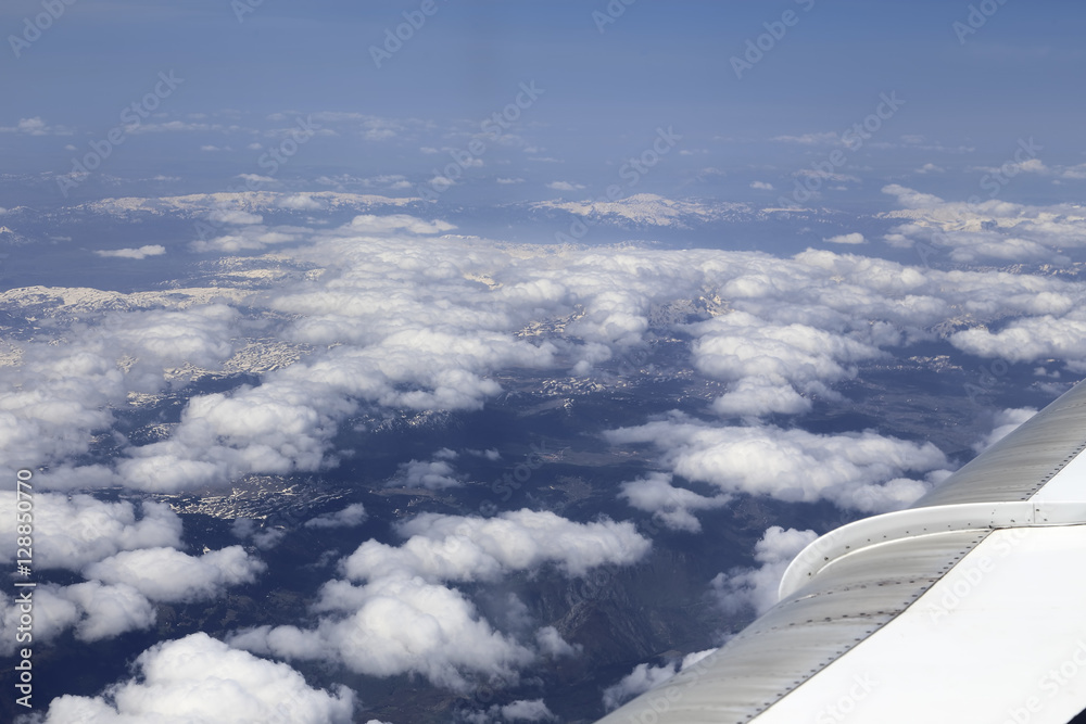 Fototapeta premium View from window of a jet plane wing with beautiful weather