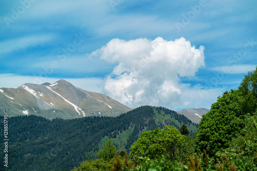 vertical clouds over mountains