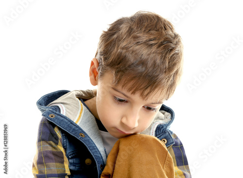 Portrait of little thoughtf...