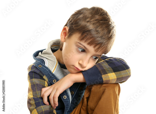 Portrait of little thoughtf...