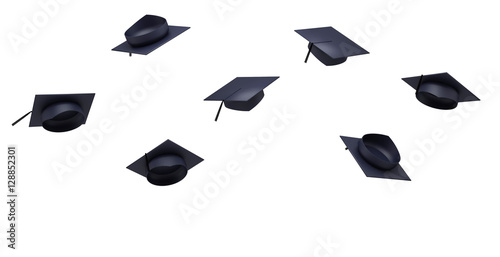 Thrown graduation hats in the air