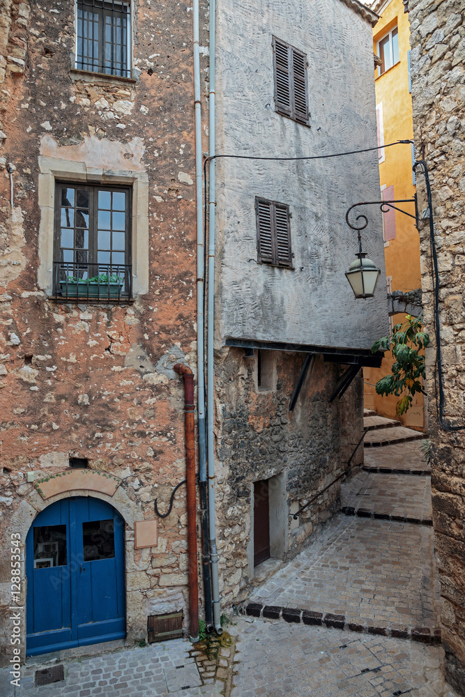 Narrow cobbled street in the old village France.