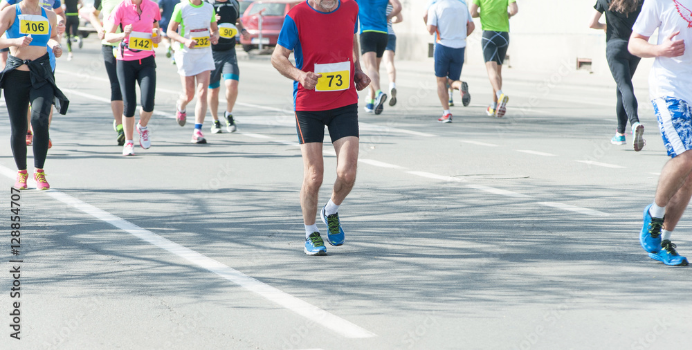 Marathon, street runners  in spring day