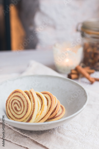 Homemade cinnamon roll cookies - delicious treat for winter holiday season. photo