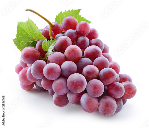 Ripe red grape. Pink bunch with leaves isolated on white. With c