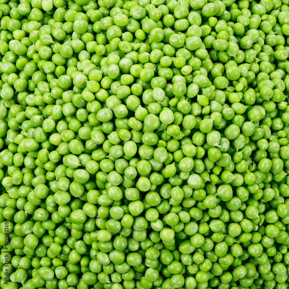 Fresh raw peas. Green background. Fresh raw peas. Green background.