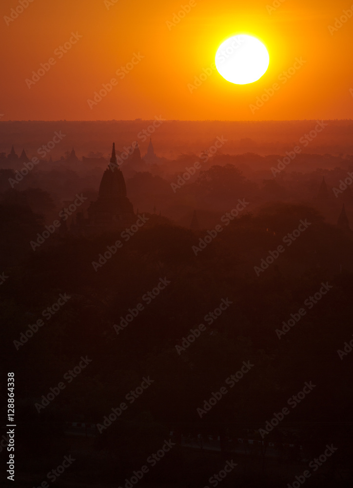 Bagan pagodas valley shot at sunrise. Vertical shot