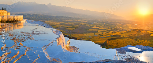Panorama terraces from travertine in Pamukkale at sunset. photo