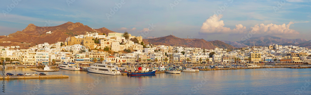 CHORA, GREECE - OCTOBER 7, 2015: The panorama of town Chora (Hora) on the Naxos island at evening light in the Aegean Sea.