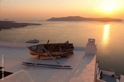 Old boat on the roof of a building in Firostefani, Santorini. Sh