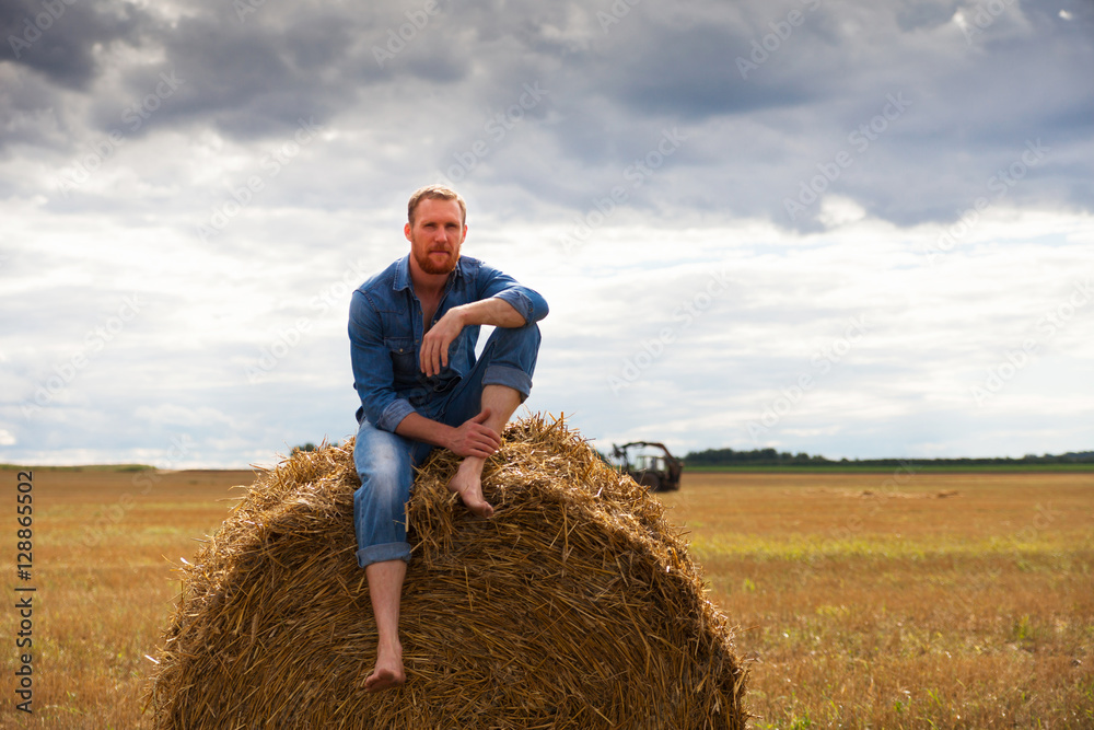bearded man on field at harvest time. bearded man on field at harvest time.