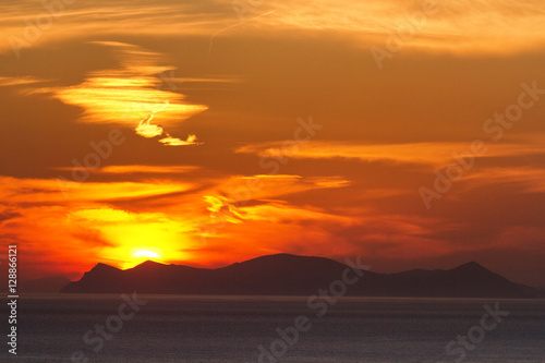 Sunset on a cloudy day in Oia, Santorini, Greece