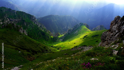 Canvas Print Panorama of amazing summer mountains under the sun rays