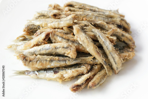 Fried anchovies in the dish, ready to be eaten