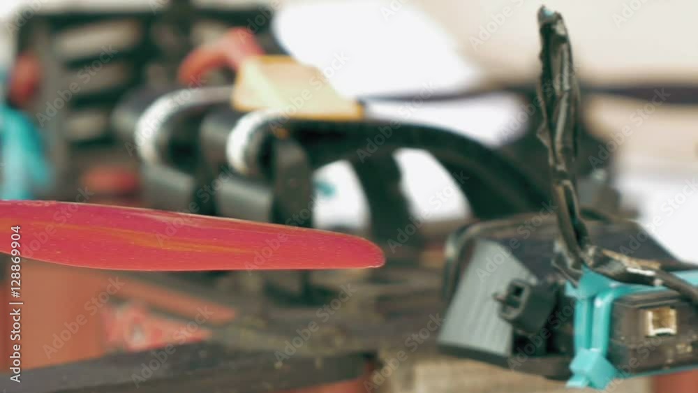 Close up of FPV drone propeller. Assembling, preparing quadcopter for flight. Repair drone before training process.