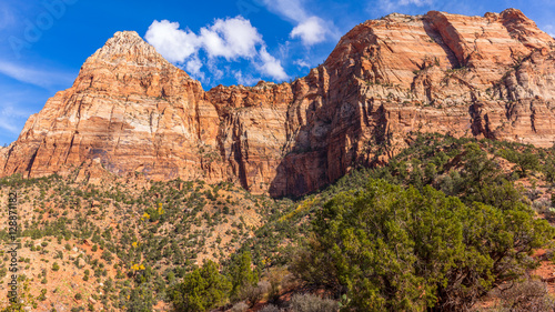 Scenic view of the canyon. The rays of the sun illuminate the canyon.  Zion National Park, Utah, USA © khomlyak