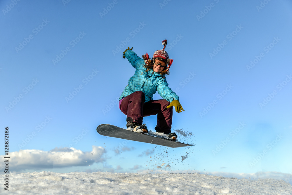 Girl jumping on the lake