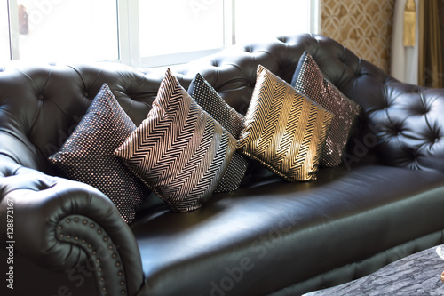black leather sofa in luxurious interior room