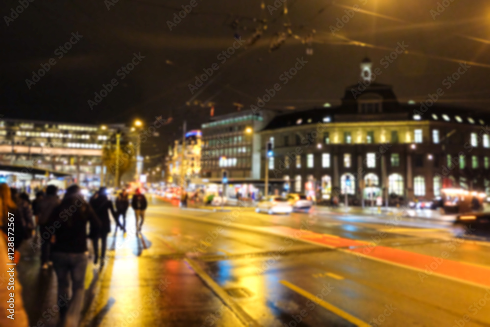 Pedestrian on Footpath with Traffic - Night street of lucerne,switzerland - Blurred for background