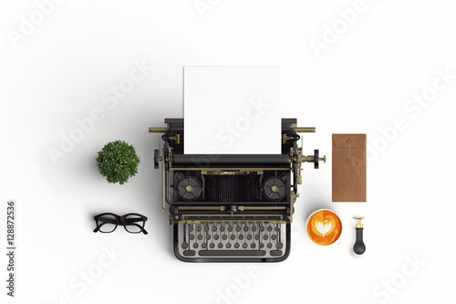  vintage typewriter paper and cup of coffee latte art on the col