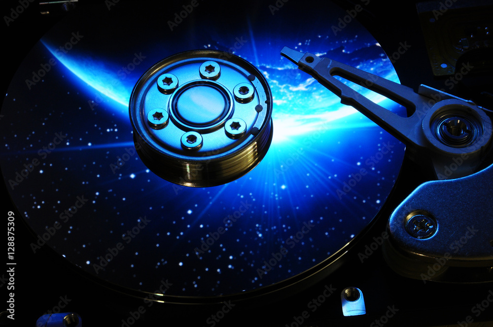 Close up of Computer Hard Disk Drive with abstract color effects ...