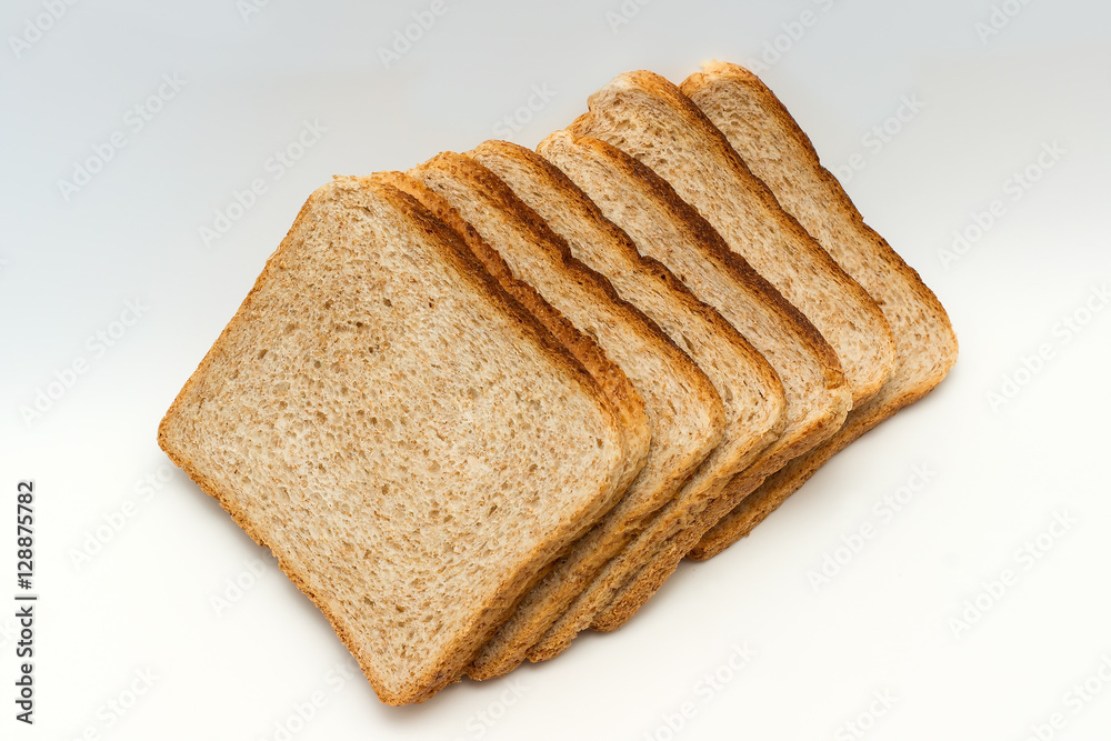 Sliced bread to toast isolated on white background. Close up. Top view Sliced bread to toast isolated on white background. Close up. Top view