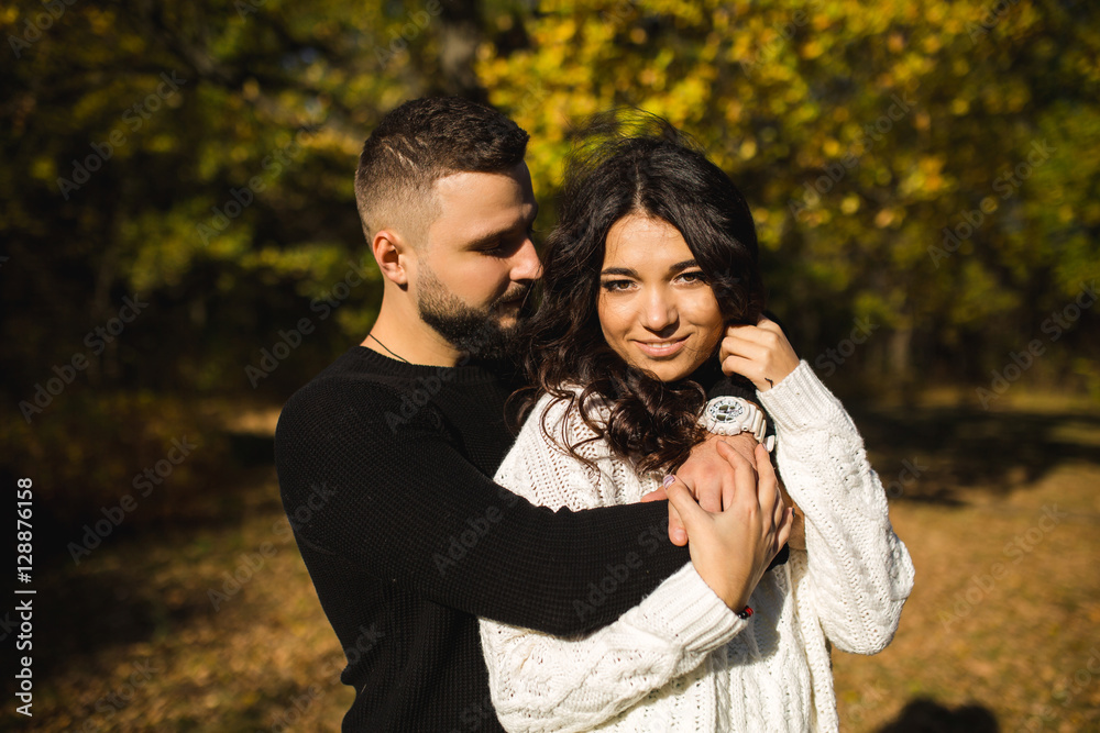 Fototapeta premium Couple in love - Beginning of a Love Story. A man and a girl on the nature while walking