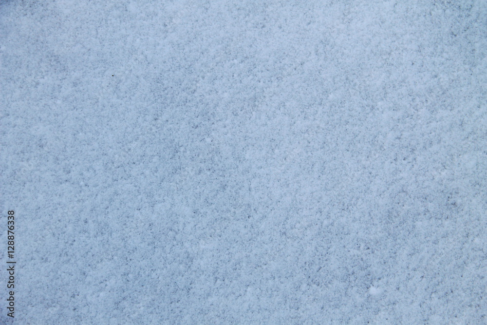 Naklejka premium Texture of the white snow. Winter background 