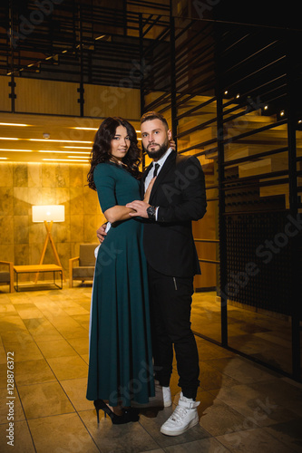 Wallpaper Mural Couple in love - Beginning of a Love Story. A man and woman in evening dress, embrace and kiss while walking Torontodigital.ca