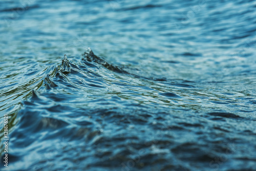 Fototapeta Naklejka Na Ścianę i Meble -  Closeup image of water waves outdoors at sea background.