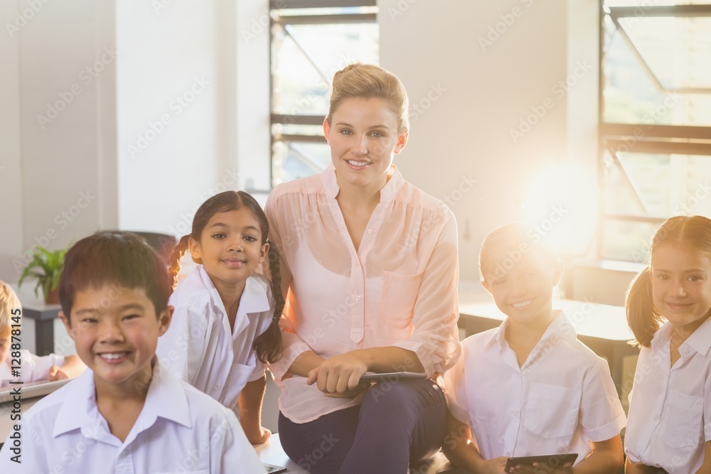 Teacher with students in classroom Teacher with students in classroom