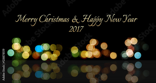 Merry Christmas and Happy new year 2017 on Bokeh Background.