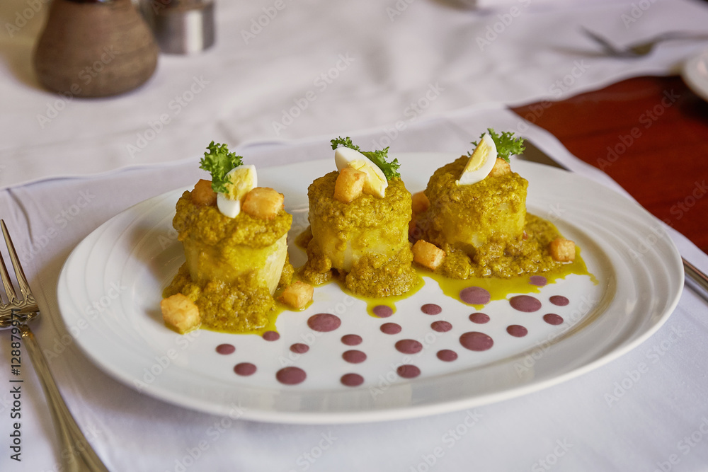 Traditional Peruvian Meal Called Ocopa Arequipena Served in a Restaurant Traditional Peruvian Meal Called Ocopa Arequipena Served in a Restaurant