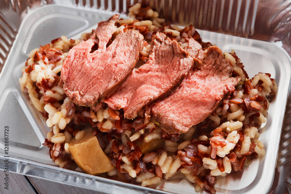 Healthy food in box, diet concept. Beef Pastrami Healthy food in box, diet concept. Beef Pastrami