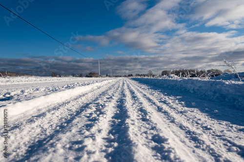 Rural road in winter time. © Janis Smits