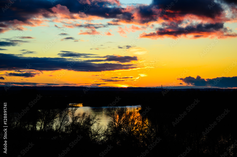 Fototapeta premium Beautiful bright sunset on river Dnieper