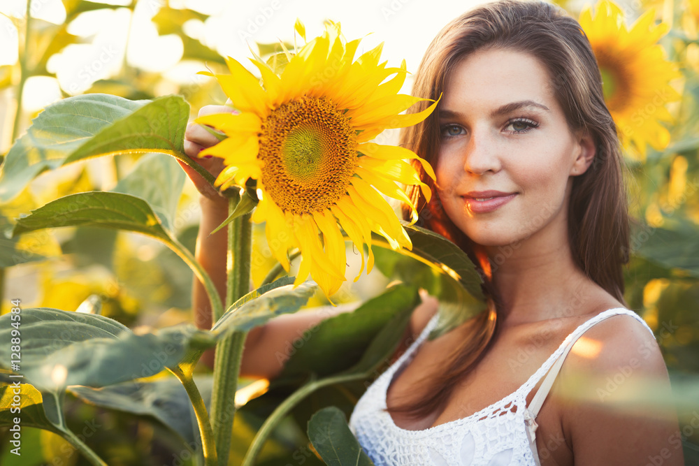 Portrait of happy woman in sunflower fields Portrait of happy woman in sunflower fields