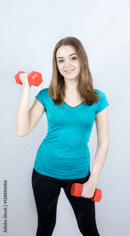 girl with dumpbells on white background sport concept gym girl with dumpbells on white background sport concept gym