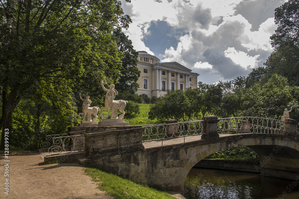 Picturesque bridge with centaurs and Palace, Pavlovsk park, suburb of Saint Petersburg, Russia