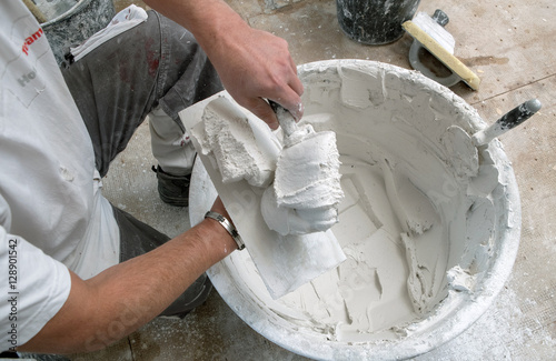 Foto Plasterer. Plastering. Trowel. Stucadoor.