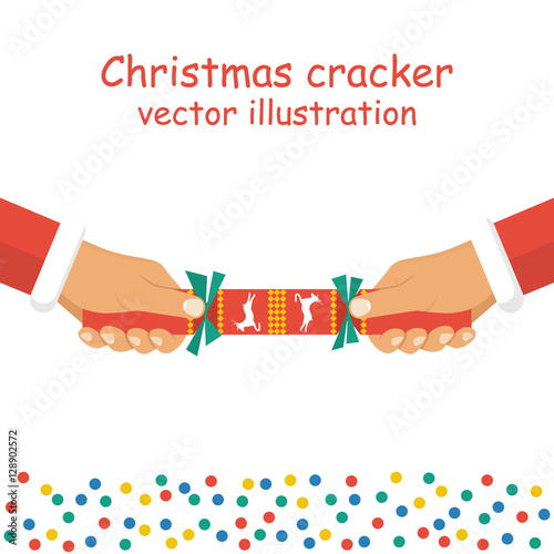 Christmas cracker holding in hand
