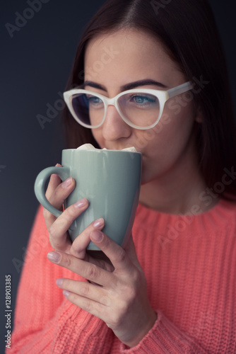 Girl drinks coffee