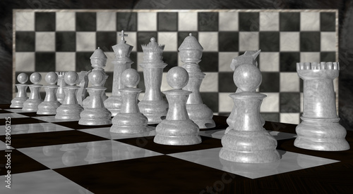 Close up of white chess pieces with blurred chess background