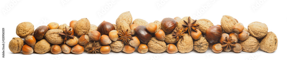 Stacked nuts for decoration isolated on white backdrop Stacked nuts for decoration isolated on white backdrop