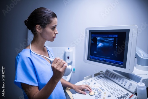 Nurse using ultrasonic device