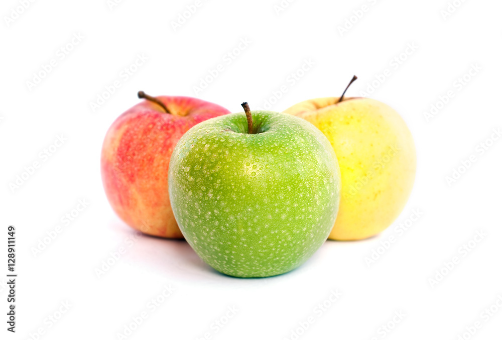 Red, green and yellow apples on white Red, green and yellow apples on white