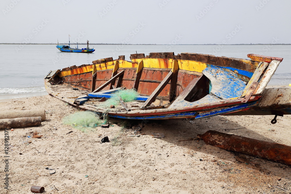 Fishing boat stranded on the beach. Diogue island-Basse Casamance-Senegal. 2069