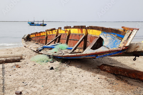 Fishing boat stranded on the beach. Diogue island-Basse Casamance-Senegal. 2069